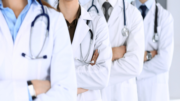 several doctors standing in a row