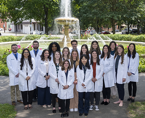image of AHN Pharmacy Residents in front of the Northeast Fountain in Allegheny Commons Park