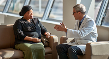 AHN doctor talking to a patient.